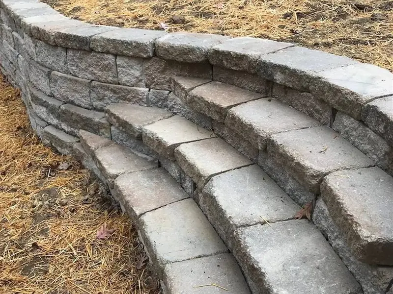 Block retaining wall with built-in steps in Rolla, MO